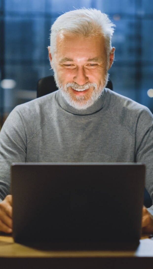 Man working within his CRM using data that has seamlessly synced from his Access Volcanic website