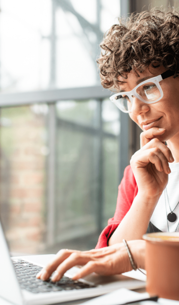 Woman checking the results of her DE&I score and report by Diversely