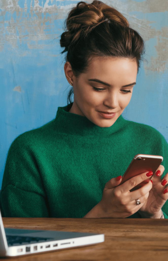 Woman using her recruitment agency's candidate portal to apply for jobs